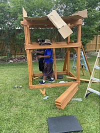 Putting together the Chateau swing set